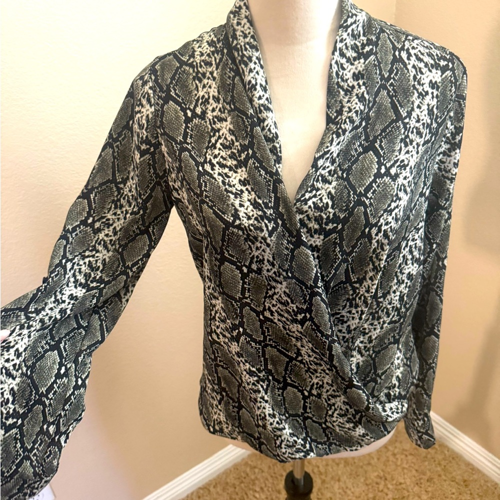 Snake skin printed blouse.